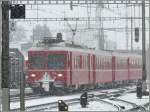 Be 4/4 516 trifft als R1530 bei dichtem Schneetreiben in Landquart ein. (21.03.2008)