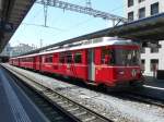 RhB - Triebwagen Be 4/4 515 mit 2 Personenwagen 2 Kl. sowie 1 Steuerwagen 1+2 Kl. als Regio im Bahnhof von Chur am 07.05.2009