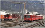 S1 1518 mit Be 4/4 511 und Ge 6/6 II 701  Raetia  in Landquart.