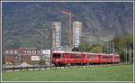 Die S1 1523 mit Steuerwagen 1712 und Be 4/4 515 hat soeben die neuen Twin Towers in Chur West passiert.