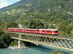 RhB - Regio nach Chur mit dem Be 4/4 515 an der Spitze unterwegs bei Reichenau-Tamins am 20.09.2013