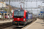 193 054 von SBB Cargo National fuhr am 7. November 2024 als Lokzug von Cornaux nach Lausanne Triage. Durchfahrt in Neuchâtel. 