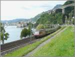 Die Werbelok Re 460 094-6  La mobilit commence  la gare  zieht am 02.08.08 den IR Genve-Brig am Genfer See und am Chteau de Chillon vorbei. (Jeanny)