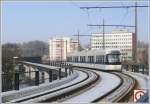 Glatttalbahn auf dem Viadukt zwischen Kloten Balsberg und Zrich Flughafen.