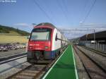 RABe 514 030-6 und ein weiterer DTZ stehen 8.7.2015 als S5 in Niederweningen.