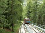 Samedan/Engadin.Wagen der Bergbahn Muottas Muragl(MMB)bei der Kreuzungsstelle.25.06.09