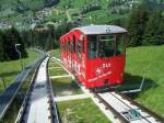 Standseilbahn Unterwasser 910 m - Iltios 1350 m am 30.06.2006 an der Ausweichstelle, der andere Wagen fhrt bergauf, im Hintergrund Unterwasser. Von Iltios fhrt eine Luftseibahn auf den Chserrugg, dem Ersten der sieben Churfirsten.