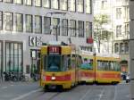 BLT - Tram Be 4/8 219 und Be 4/6 unterwegs auf der Linie 11 in Basel am 29.04.2010