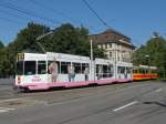 Doppeltraktion mit dem Be 4/8 247 und der Evian Vollwerbung und dem Be 4/6 111 auf der Linie 10 kurz vor der Haltestelle Bahnhof SBB.