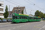 Doppeltraktion, mit dem Be 4/4 501, dem B4S 1492 und dem Be 4/4 478, auf der Linie 6, fährt am 05.07.2024 bei der Haltestelle Kirche in Allschwil ein.
