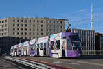 Be 6/8 Flexity 5028 mit der Werbung für die Fussball EM der Frauen 2025 in der Schweiz, auf der wegen einer Grossbaustelle zwischen Hardstrasse und Pratteln umgeleiteten Linie 14, überquert