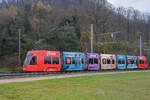 Be 6/8 Flexity 5010 mit der Werbung für das Möbelhaus Pfister, auf der Linie 14, fährt am 02.12.2024 zur Haltestelle Lachmatt.