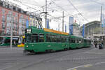 Doppeltraktion, mit den Be 4/4 479 und 496 zusammen mit dem B4S 1463, auf der Linie 2, verlässt am 18.12.2024 die Haltestelle beim Bahnhof SBB. Aufnahme Basel.