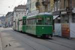 Schindler - Guggummere  672  und Anhängewagen der Firma Schindler Schweizer Standardwagen  1500  fährt am 07.06.2015 zum Badischen Bahnhof. Aufgenommen an der Clarastrasse in Basel.