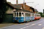 TPC/AOMC/BLT: Regionalzug Aigle-Monthey mit dem Be 4/4 103 (ehemals BTB) und einem B4 auf der alten Strassenbahnstrecke bei Aigle im August 1986.