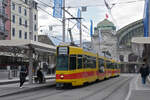 Doppeltraktion, mit dem Be 4/8 210 und dem Be 4/6 233 wartet am 18.12.2024 mit der Fahrschule an der Haltestelle Bahnhof SBB.