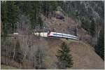 ICN 676 von Lugano nach Basel zwischen dem Strahlloch-Tunnel und der Mittleren Meinreuss Brücke bei Wassen.