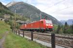 185 110-4 und eine weitere BR 185 streben mit ihrem Kieszug durch die Wattingerkurve bei Wassen dem Gotthard entgegen.