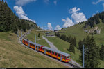 Bahnforum-Schweiz-Fotofahrt auf der BVB am 10. September 2016. HGe 4/4 32 befindet sich mit ihrem Zug auf Talfahrt bei Les Bouquetins.