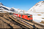 Am 27.03.2022 ist MGB Deh 4/4 23 unterwegs mit einem Autozug nach Andermatt und konnte hier bei Nätschen aufgenommen werden