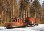 ASm/RVO/OJB: OJB Kehrichtzug Langenthal-Niederbipp zwischen Aarwangen und Bannwil mit der Ge 4/4 56, 1917 (ehemals LMB) im Februar 1984.
Foto: Walter Ruetsch