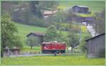 Ge 4/4 I 605  Silvretta  hat zwei leere Holzwagen nach Furna gebracht und ist jetzt bei Schiers auf der Rckfahrt nach Landquart. (05.05.2009)