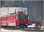 RE1033 nach Davos Platz bei Seewis-Valzeina mit Ge 4/4 III 651  Fideris . (12.02.2010)
