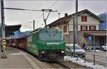 Ge 4/4 III 647  Grüsch  mit RE 1037 nach Davos Platz in Landquart.