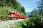 RhB Regionalzug 261 von Chur nach Disentis am 01.09.1997 bei Farsch zwischen Reichenau und Trin mit E-Lok Ge 4/4 I 603 - B 2348  - B 2434 - B 2351 - A 1241 - D 4213.