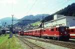 RhB Regionalzug 264 von Disentis nach Chur am 02.09.1995 in Disentis mit E-Lok Ge 4/4 II 623 - D 4207 - B 2331 - B 2369 - A 1228 - B 2228 - B 2212 - B 2215. Hinweis: Bahnhofsanlagen noch vor Umbau, gescanntes Dia
