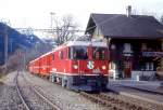 RhB Regionalzug 635 von Chur nach Arosa am 29.11.1997 in Peist mit E-Lok Ge 4/4II 633 - D 4213 - B 2427 - B 2374 - AB 1566 - A 1269 - A 1227. Hinweis: Erster Betriebstag unter Wechselstrom 
