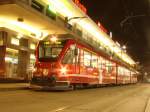 Chur, Bahnhofplatz. Am Abends der 01-02-2011, eine neue ABe 8-12 im richtung Arosa