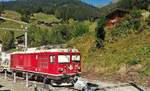 Bernina Zweikraftlok Gem 4/4 801 ist im Bauzugeinsatz auf der Arosalinie. Gestern gesehen in Langwies. (12.09.2018)