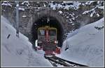 Tm 2/2 95 mit Spurpfkug Xk9141 verschwindet im Arosatunnel Richtung Chur Sand.