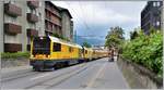 RhB Umbauextrazug nach St.Peter Molinis mit den beiden Gmf 23404+23401 verlässt Chur über die Engadinstrasse.