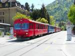 RhB - Unterwegs in der Stadt Chur kurz vor dem Bahnhof in Chur der Regio aus Arosa mit dem Steuerwagen ABt 1702 an der Spitze unterwegs am 07.05.2009