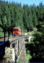 RhB EXTRA-GmP fr GRAUBNDEN TOURS 3658 von Arosa nach Chur am 31.08.1997 auf Frauentobel Viadukt mit Bernina-Triebwagen ABe 4/4I 32 - B 2247 - D 4052I - Xk 9398 - Kkl 7052 - E 6623.