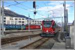 ABe 8/12 3509 rangiert in Chur neben einer Re 460 der SBB.