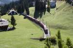 Regio aus Chur beim Arosatunnel kurz vor dem Bahnhof Arosa(1739 m..M.)29.09.11 