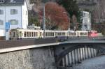 Jubiäum,100 Jahre Chur-Arosa. Nachschuss  des Alpine Pullman Classic Zug nach Arosa beim Plessurquai in Chur.13.12.14