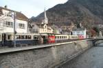 Jubiläum,100 Jahre Chur-Arosa.Alpine Pullman Classic Zug nach Arosa,am Plessurquai in Chur.Im Hintergrund der Turm der Martinskirche.13.12.14 