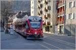 R1428 mit Allegra ABe 8/12 3515 in der Engadinstrasse in Chur (25.12.2015)