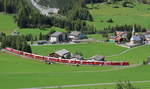 Mit der schiebenden 644 befindet sich IR1136 (St.Moritz - Chur) kurz vor dem Bahnhof von Bergün.

Bergün, 15. August 2020 