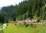 RhB Glacier-Express/Regio-Express 1149 von Chur nach St.Moritz am 16.08.2008 Einfahrt Bergn mit E-Lok Ge 4/4 III 646 - Ap 1313 - Ap 1312 - WRp 3831 - Bp 2534 - Bp 2535 - Bp 2536 - D 4214 - B 2359 - B 2437 - B 2491 - A 1238 - A 1236 - Hinweis: Lok mit Werbung: RhBUDGED
