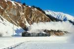 RhB Dienst-Dampfzug 9732 von Samedan nach St.Moritz am 01.02.1998 zwischen Samedan und Celerina mit Dampflok Tender voraus G 4/5 108 - B 2247 - B 2060 - D 4052I - B 2246.