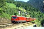 RhB Schnellzug 550 von St.Moritz nach Chur am 27.06.1995 Einfahrt Filisur mit E-Lok Ge 4/4 III 649 - A 1283 - A 1235 - B 2436 - B 2348 - B 2378 - D 4223.. Hinweis: Lok noch ohne Werbung,  gescanntes Dia
