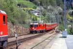 RhB Schnellzug 554 von St.Moritz nach Chur am 12.04.1992 Einfahrt Filisur mit E-Lok Ge 4/4 II 632 - 2x A - 3x B - D.