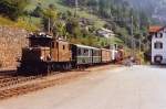 RhB: Gemischter Zug mit der CC 415 in Filisur im Oktober 1987.