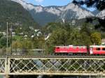 RhB - Ge 4/4 610 vor Regio auf der Rheinbrcke bei Reichenau am 26.09.2011