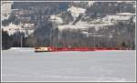 RE1129 mit Ge 4/4 III 641  Maienfeld  bei Bonaduz. (12.02.2012)